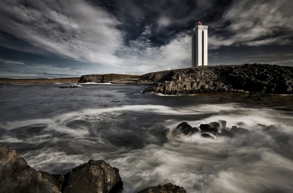 Dramatic Coastal Lighthouse by Bragi Ingibergsson - BRIN — canvas wall art