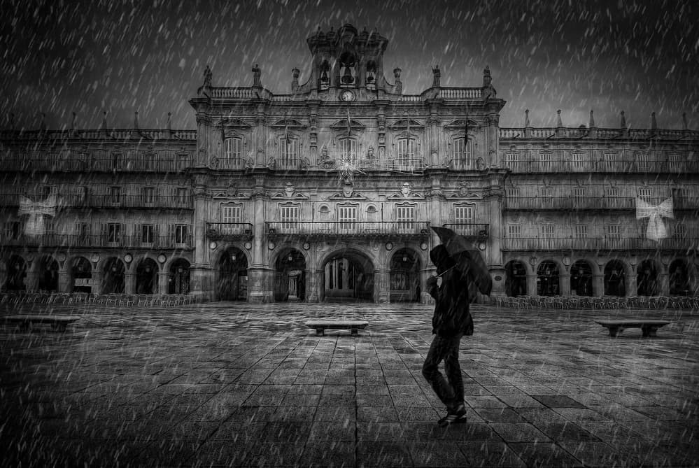 Walking along the square by Jose C. Lobato — canvas wall art
