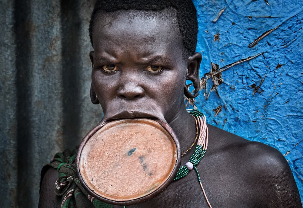 Tribal Woman Lip Plate by Joxe Inazio Kuesta Garmendia — canvas wall art