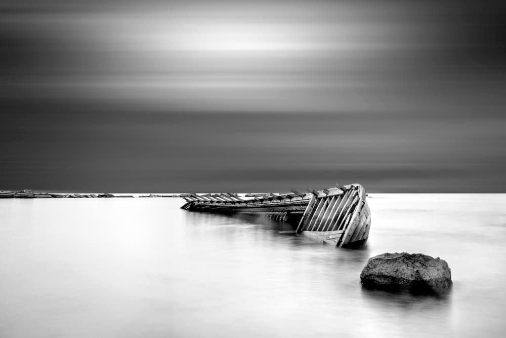 Abandoned Boat Seascape by Antonyus Bunjamin (Abe) — canvas wall art