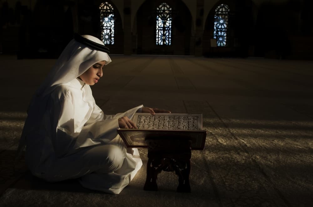 Muslim Reading Holy Book by Saeed Dhahi — canvas wall art
