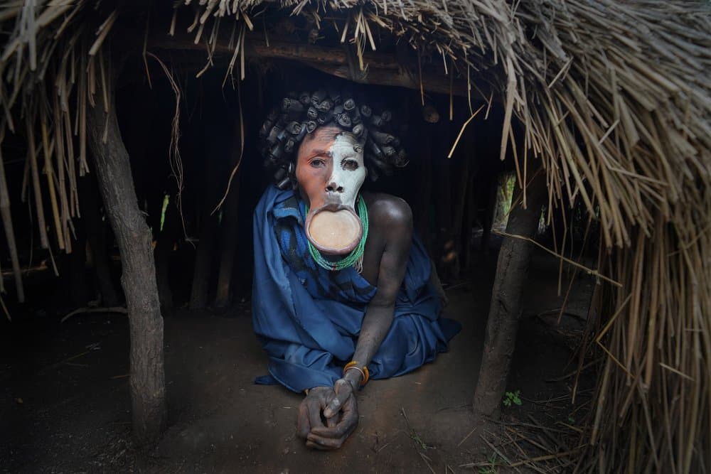 Mursi Woman Lip Plate by Sarawut Intarob — canvas wall art
