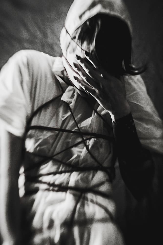 Bound Woman Dark Portrait by Bogdan Bouşcă — canvas wall art