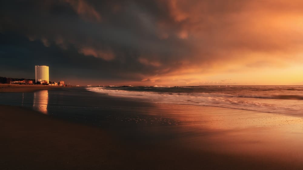 Dramatic Beach Sunset by Paolo Lazzarotti — canvas wall art