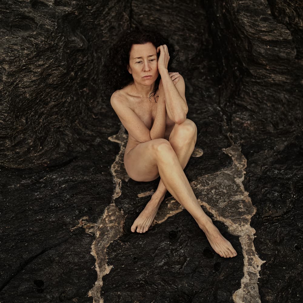 Pensive Woman on Stone by michel genève — canvas wall art