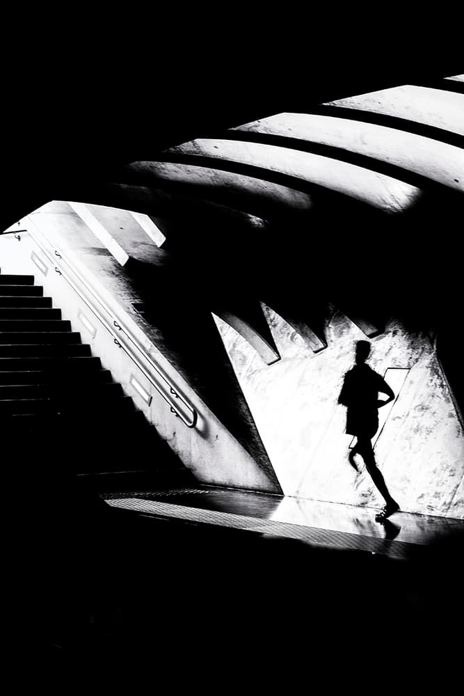 Runner in Light and Shadow by Massimo Della Latta — canvas wall art
