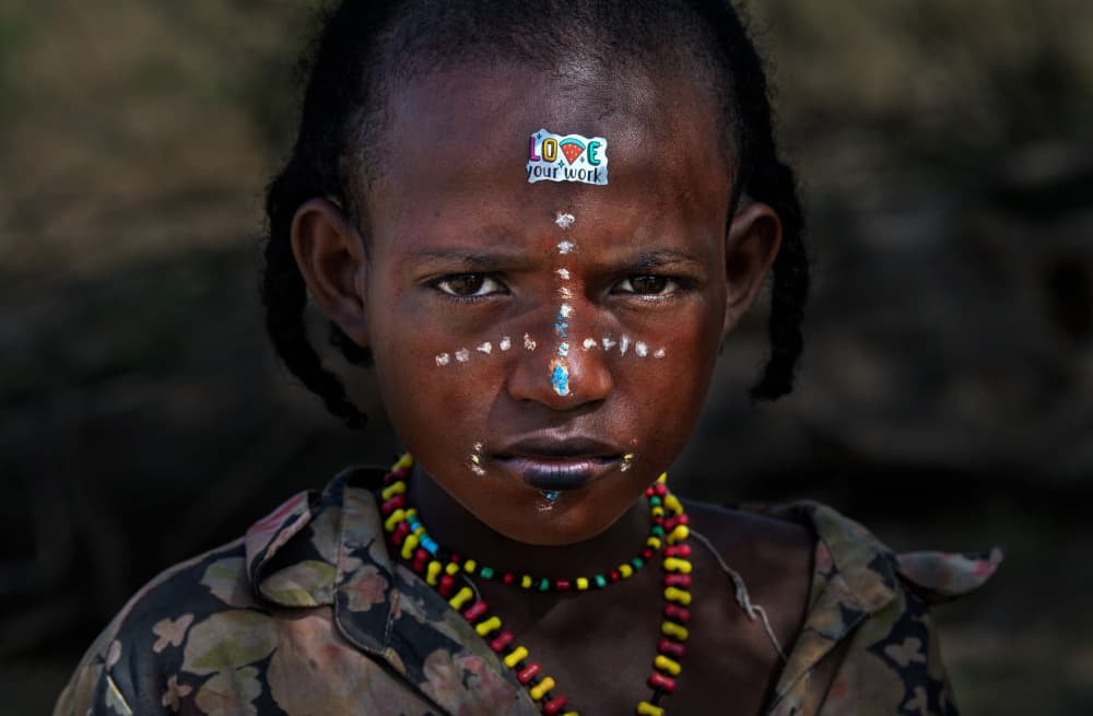 Tribal Face Paint Portrait by Joxe Inazio Kuesta Garmendia — canvas wall art