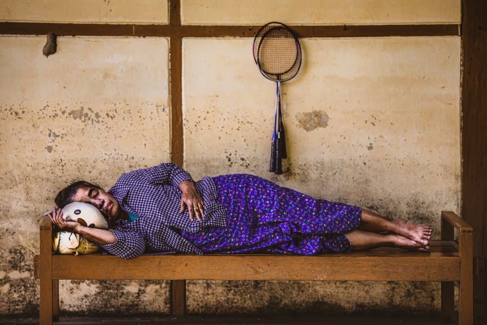 Resting woman and her doll by Marco Tagliarino — canvas wall art