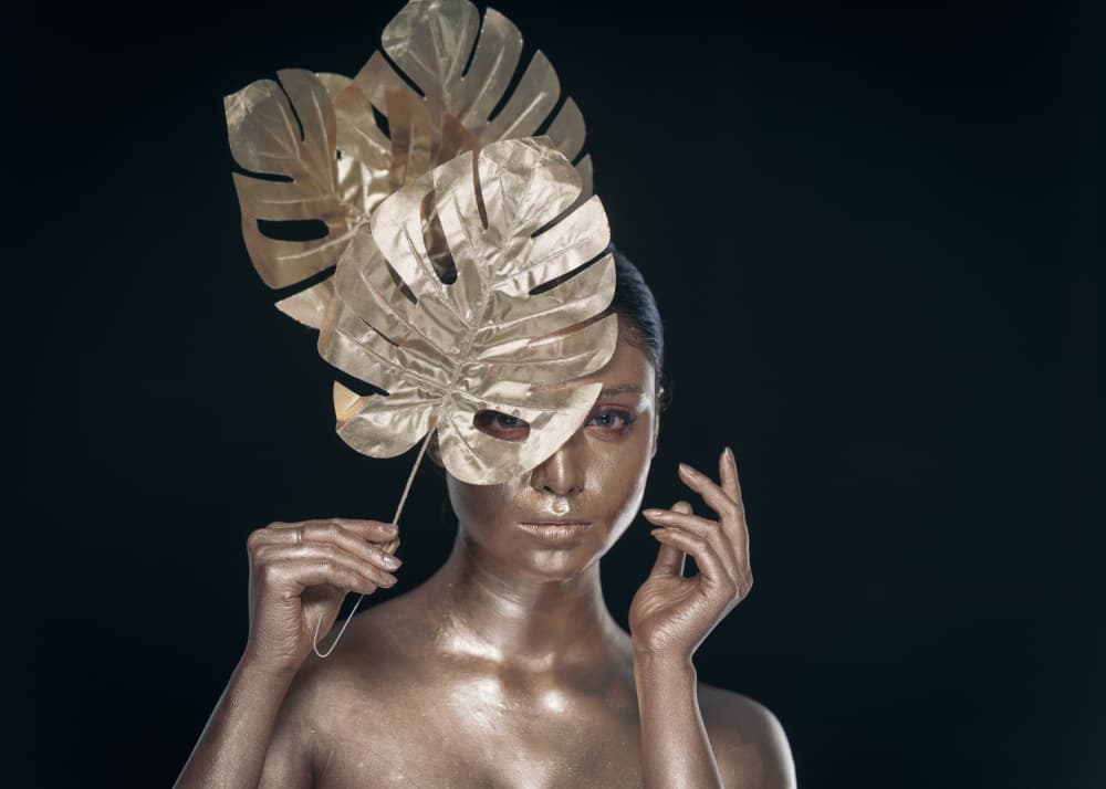Golden Monstera Woman by HIRAK BHATTACHARJEE — canvas wall art