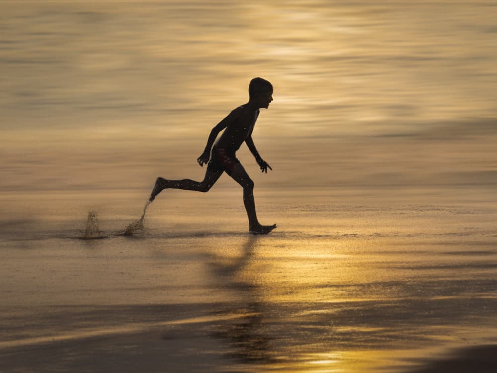 Golden Hour Beach Run by Irene Wu — canvas wall art