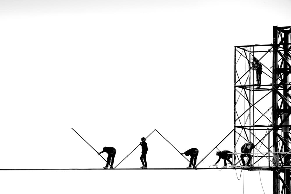 Industrial Teamwork Silhouettes by Ekkachai Khemkum — canvas wall art