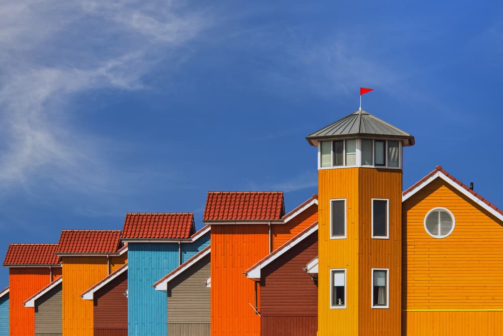 Vibrant Coastal Architecture by Theo Luycx — canvas wall art