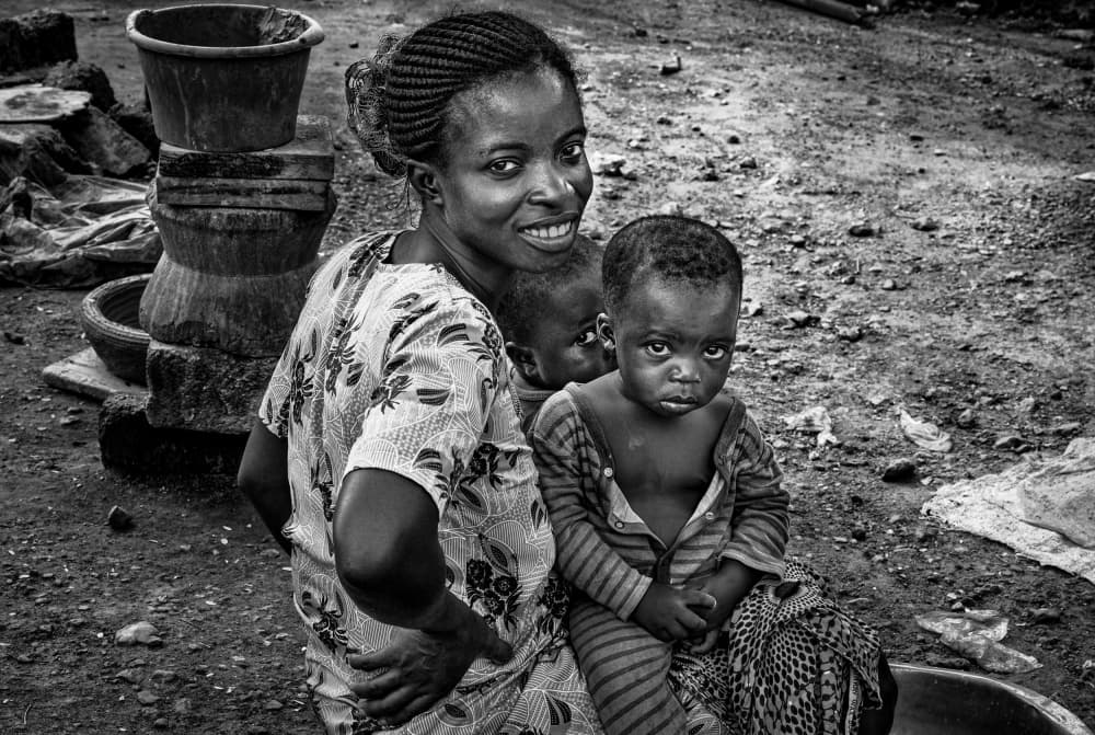 Smiling African Family by Joxe Inazio Kuesta Garmendia — canvas wall art