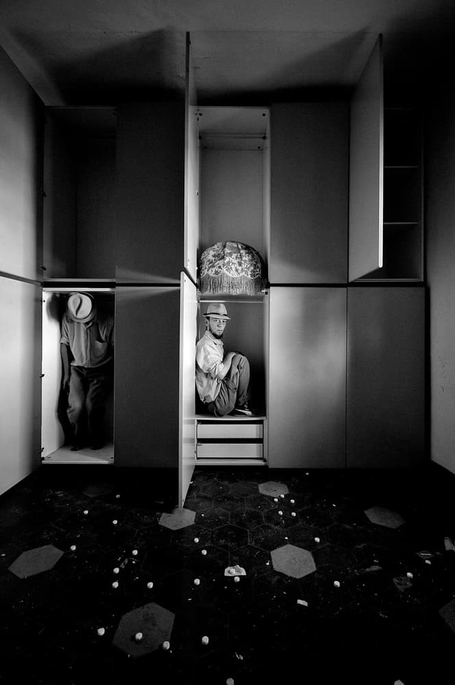 Men In Wardrobes by Carlo Ferrara — canvas wall art