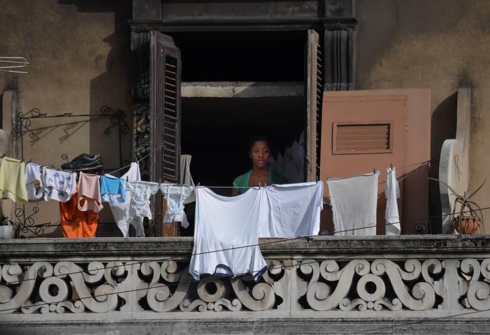 Balcony Laundry Day by Itzik Einhorn — canvas wall art