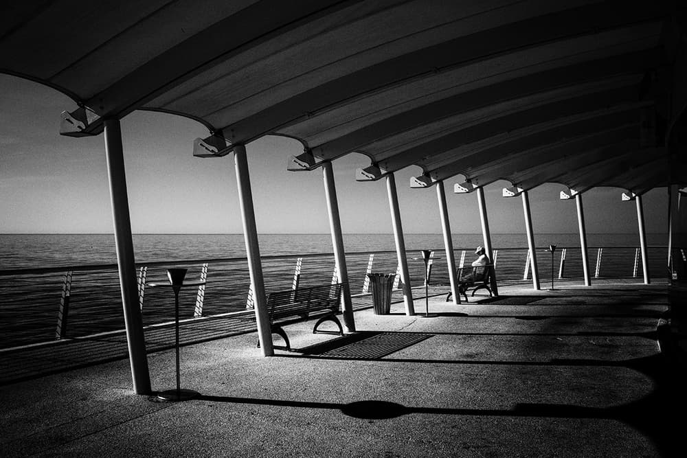 Pier Solitude by Sea by Massimo Della Latta — canvas wall art