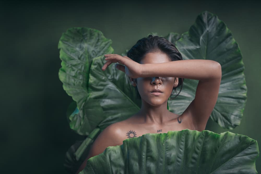 Woman Embraced By Leaves by HIRAK BHATTACHARJEE — canvas wall art