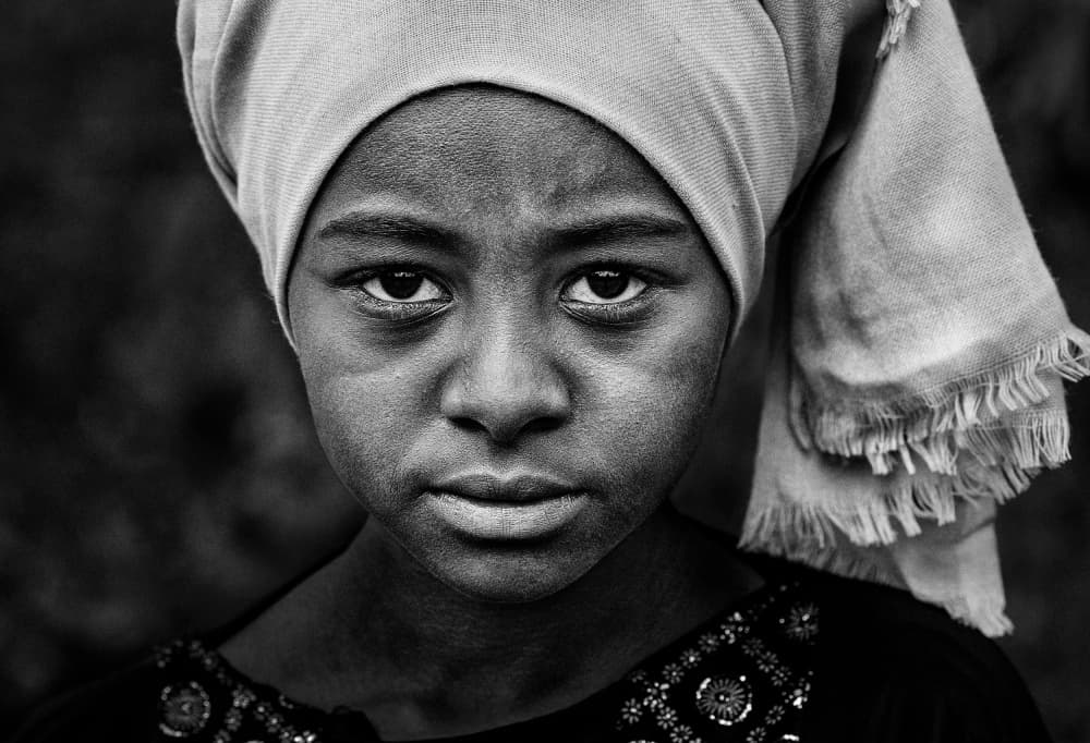 Young Woman's Deep Gaze by Joxe Inazio Kuesta Garmendia — canvas wall art