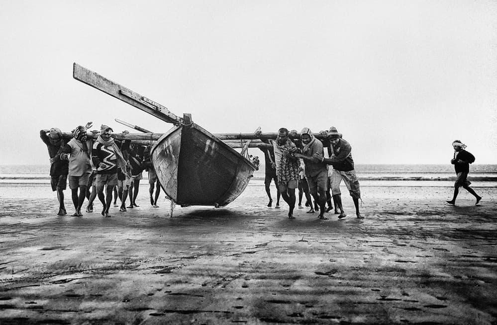 Men Hauling Boat by Avishek Das — canvas wall art