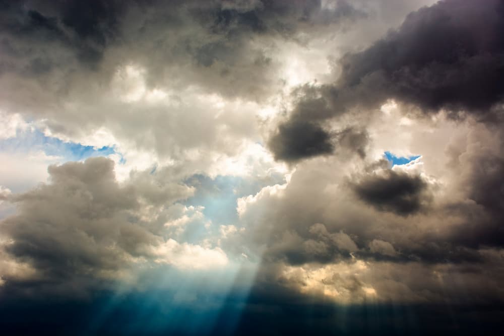 Dramatic Sun Rays Through Clouds by Tal Paz-Fridman — canvas wall art
