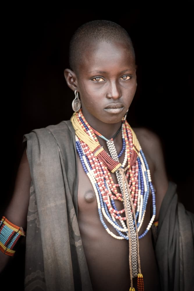 Tribal Woman Adorned by Trevor Cole — canvas wall art