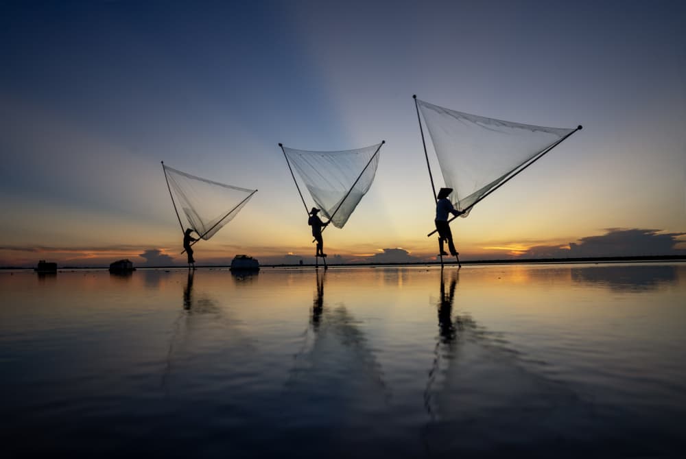 Golden Hour Fishermen by Sarawut Intarob — canvas wall art