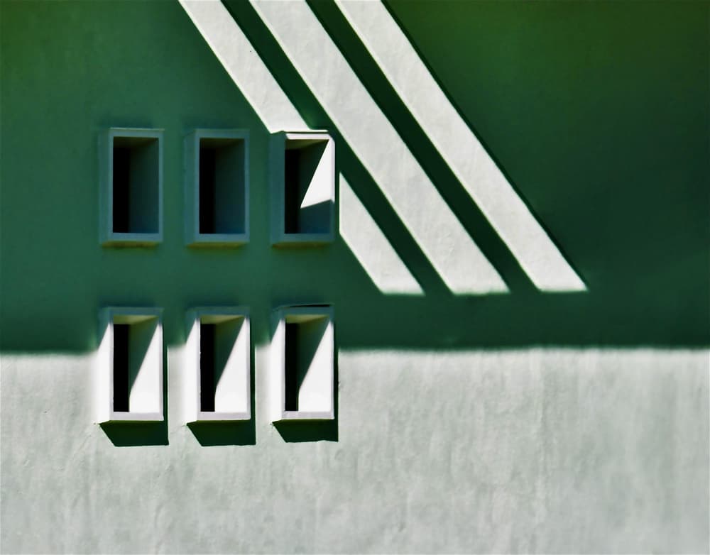 Sunlit Architectural Shadows by Arnon Orbach — canvas wall art