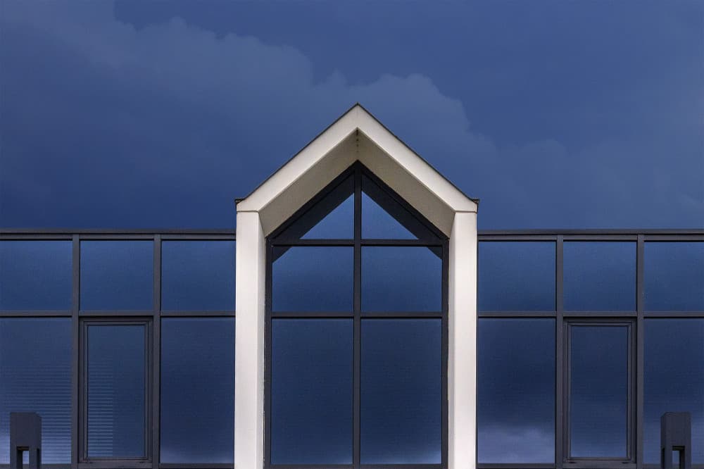 Geometric Blue Facade by Jef Van den Houte — canvas wall art
