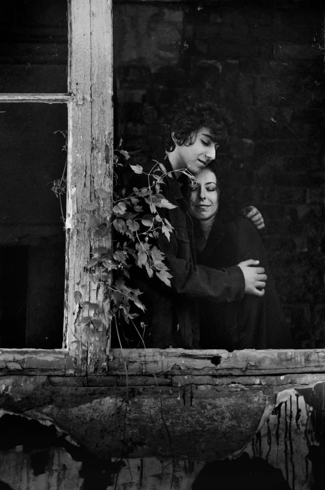 Loving Embrace in Window by Desislava Ignatova — canvas wall art