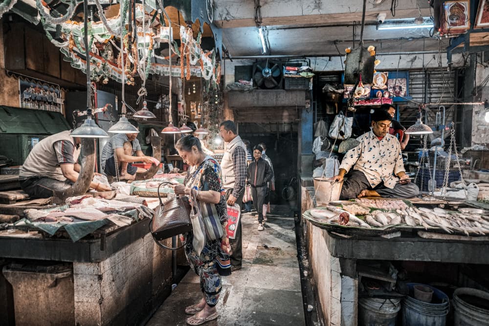 Bustling Fish Market by Subhajit Das — canvas wall art