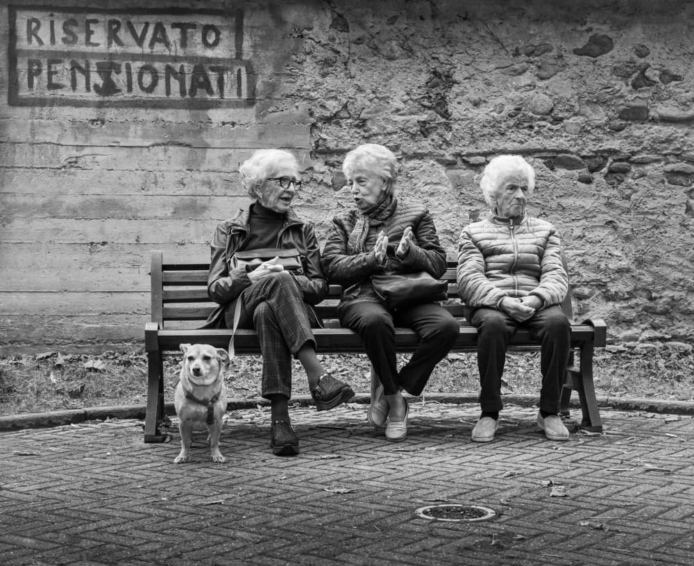 Italian Seniors Chatting by Giorgio Toniolo — canvas wall art