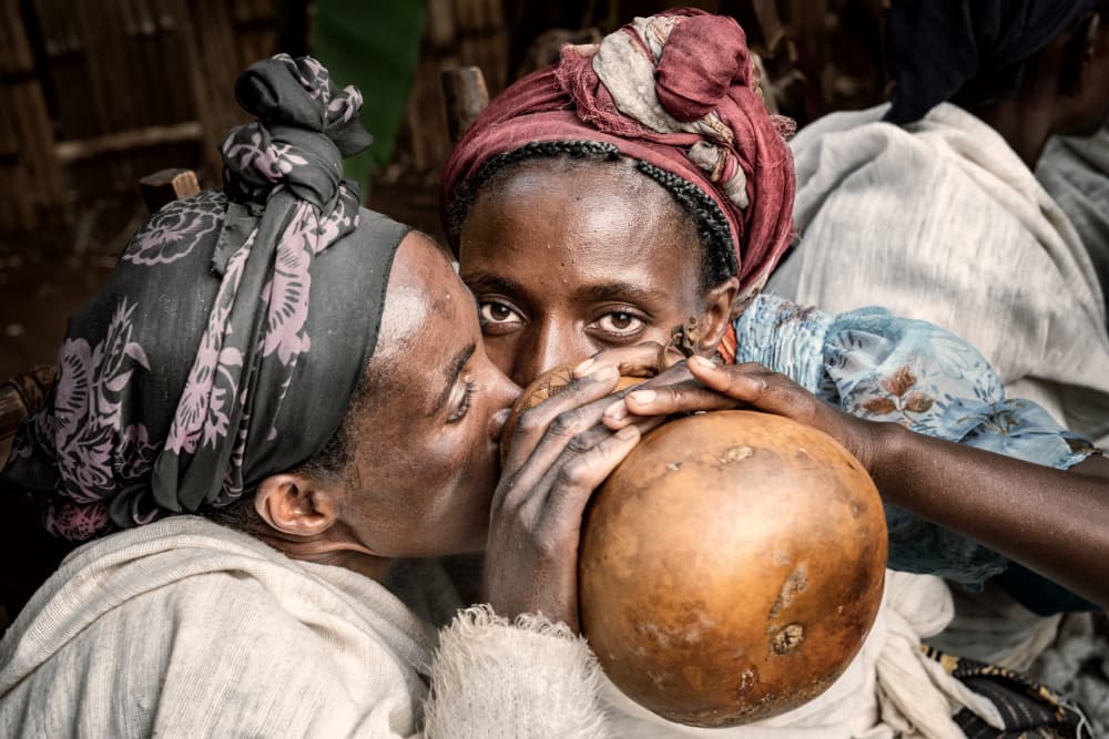 Ethiopian Women Sharing by Trevor Cole — canvas wall art