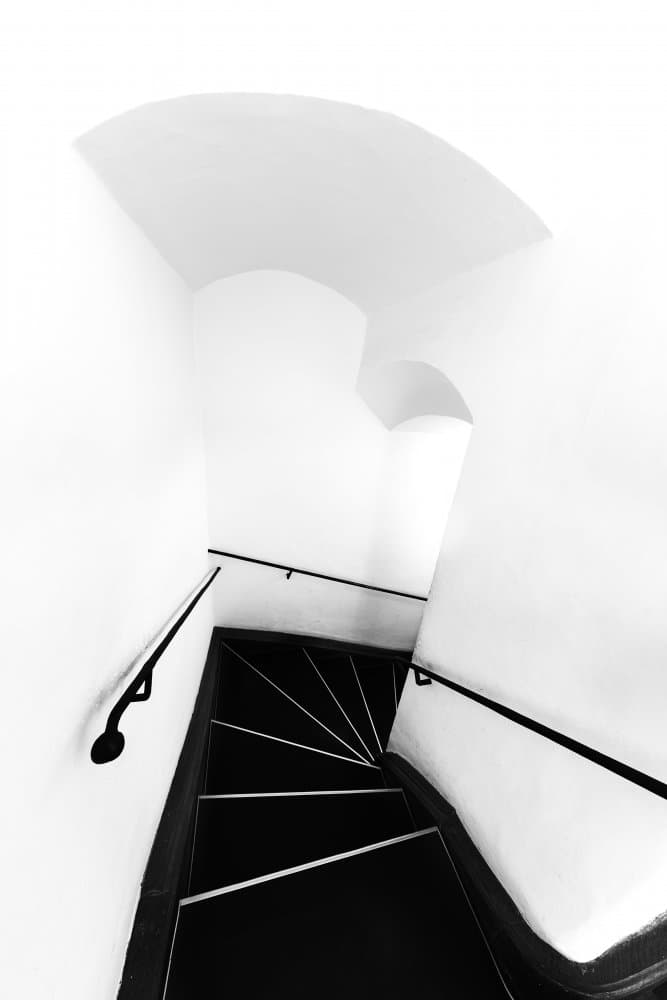 Descending Spiral Staircase by Jassi Oberai — canvas wall art