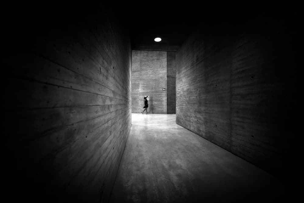 Lone Figure Concrete Hallway by Jorge Pimenta — canvas wall art