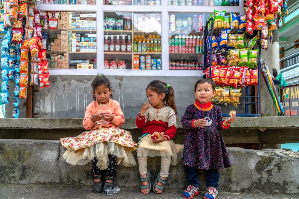 Three Girls At The Shop by Ilana Lam — canvas wall art