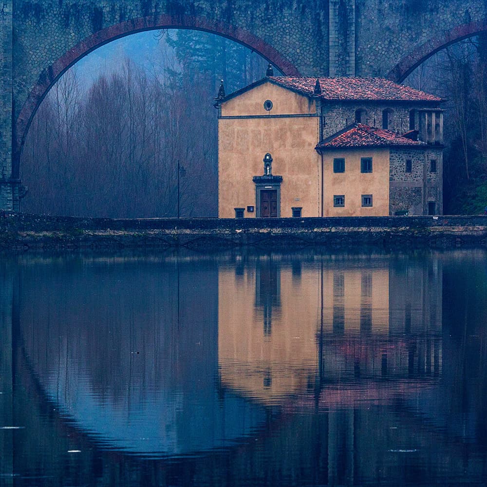 Misty Bridge Reflection by Massimo Della Latta — canvas wall art