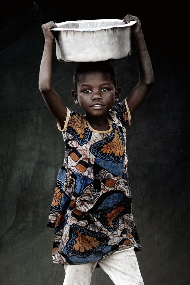 Young Girl Carrying Basin by Antonio Grambone — canvas wall art