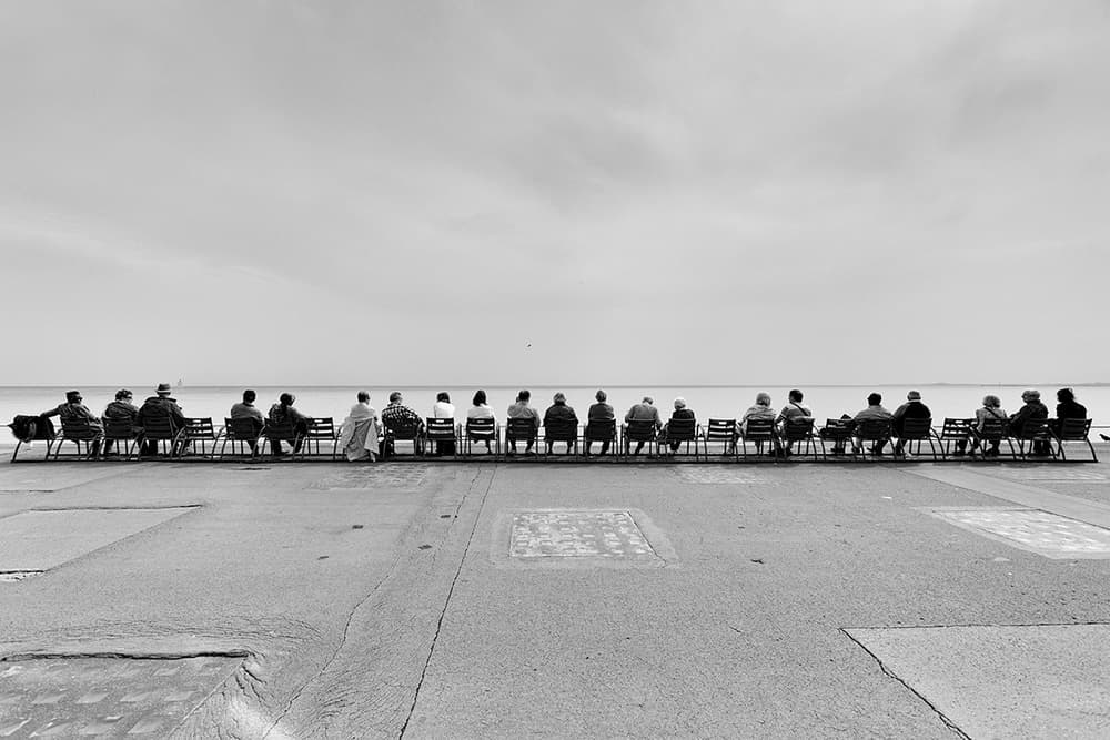 Sitting By The Sea by Massimo Della Latta — canvas wall art