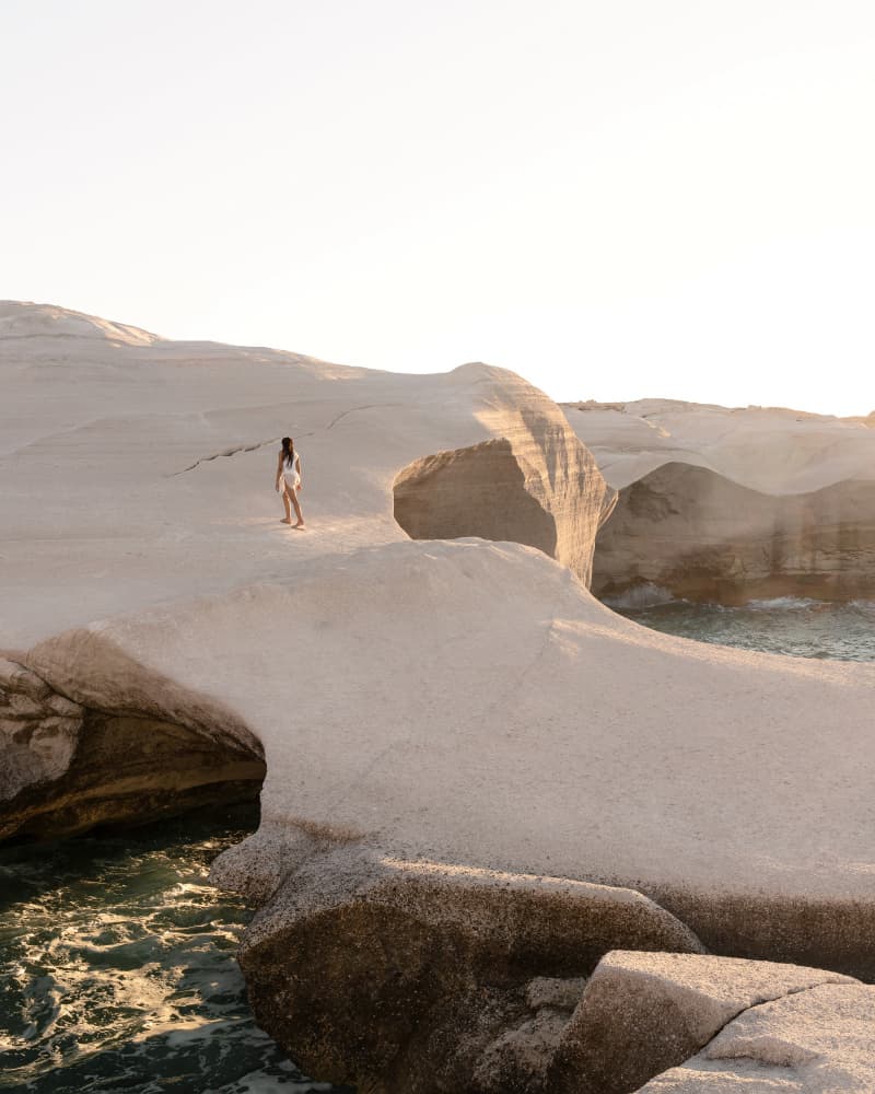Woman on White Rocks by Minorstep — canvas wall art