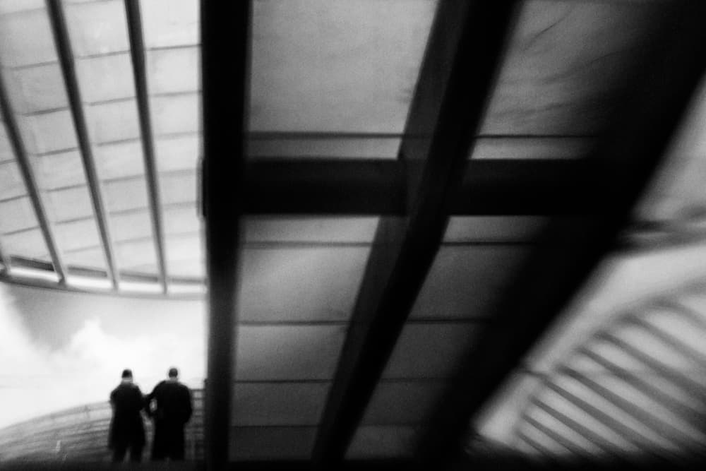 Two Figures Architectural Blur by Laura Mexia — canvas wall art