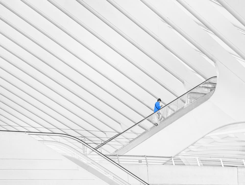White Architecture Blue Figure by Anette Ohlendorf — canvas wall art