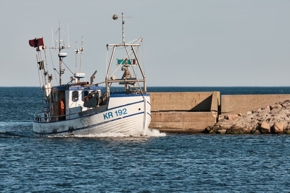 Fishing Boat Departing Harbor by Geertjan Plooijer — canvas wall art