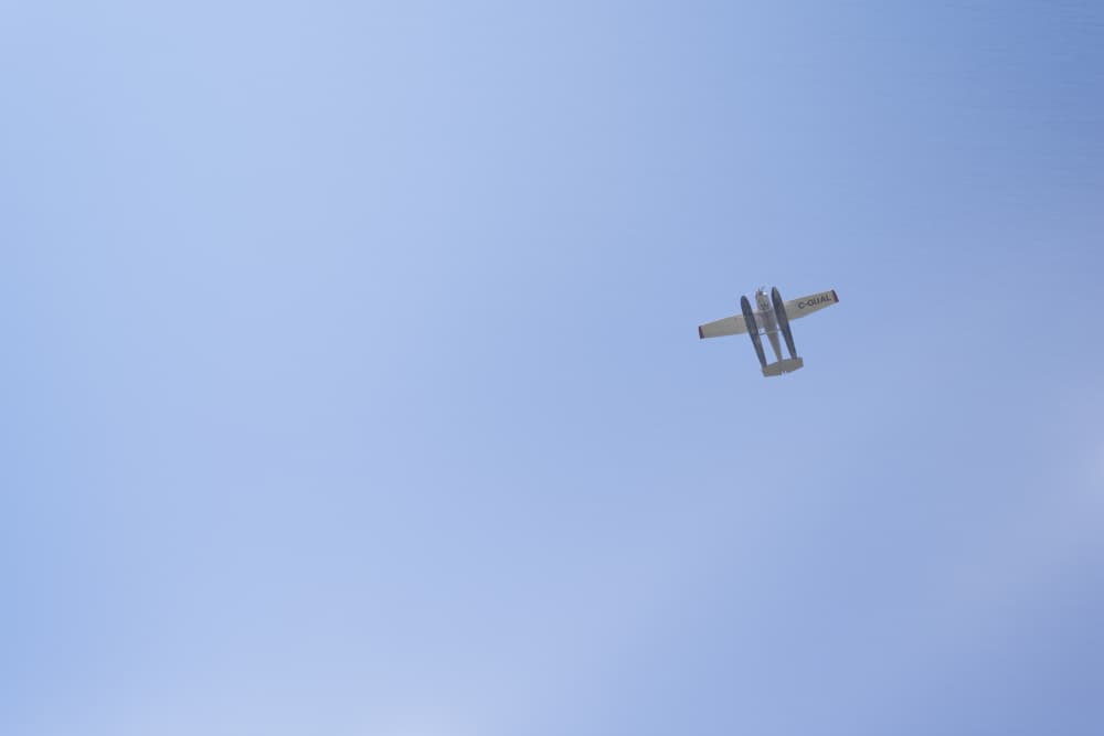 Blue Sky Seaplane by Lynann Colligan — canvas wall art