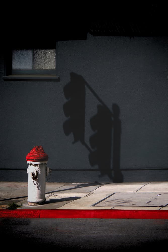 Red Hydrant Shadows by Roxana Labagnara — canvas wall art