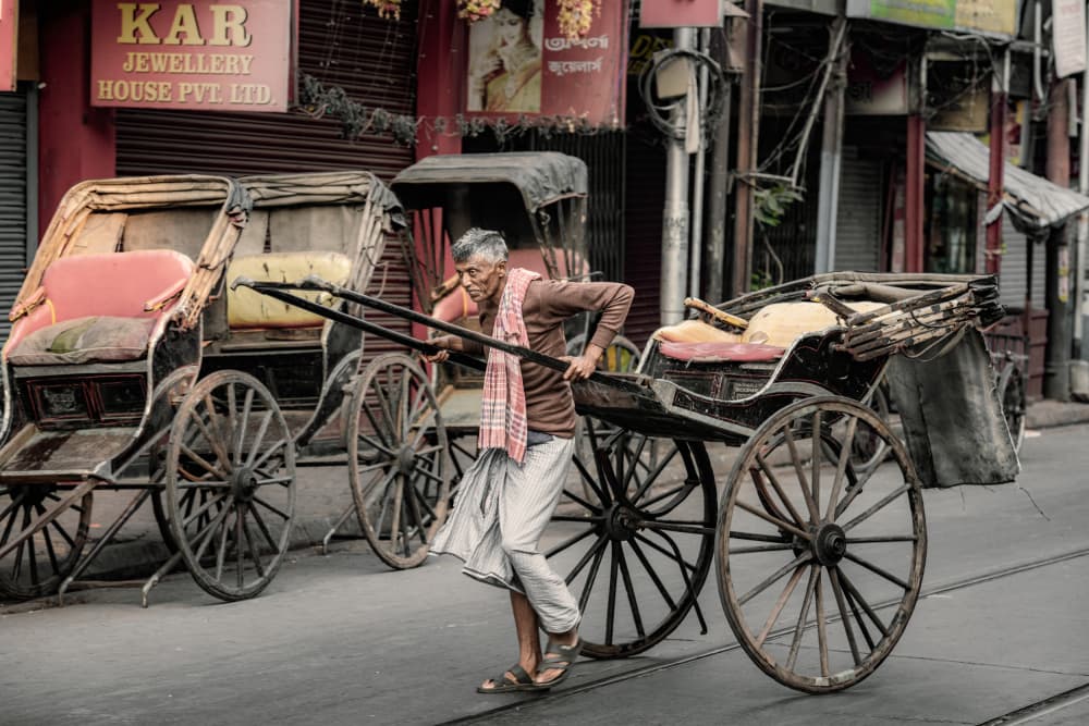 Kolkata Rickshaw Puller by Trevor Cole — canvas wall art
