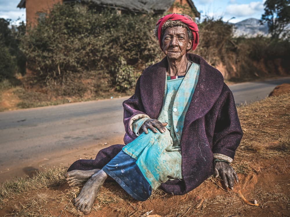 Weathered Roadside Woman by Marco Tagliarino — canvas wall art