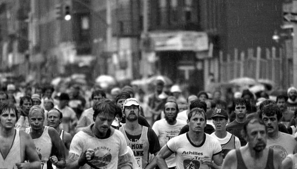 Runners In The Rain by Michael Castellano — canvas wall art