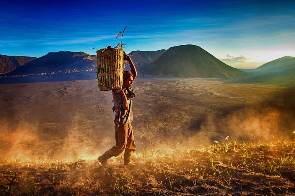 Man's Volcanic Dawn Journey by Angela Muliani Hartojo — canvas wall art