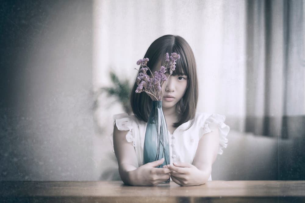 Pensive Girl With Flowers by 7 Flavor C/P — canvas wall art