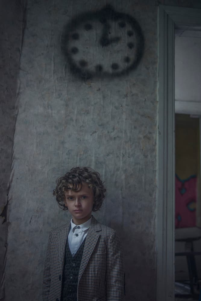 Young Boy Timeless Gaze by Ewa Cwikla — canvas wall art